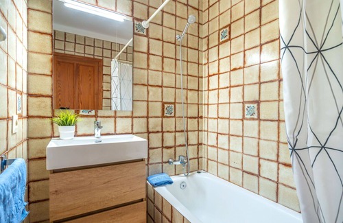 Cala Carbo Apartment | Spacious Apartment for 8 with Pool, Ocean View & A/C