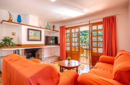 Cala Carbo Apartment | Spacious Apartment for 8 with Pool, Ocean View & A/C