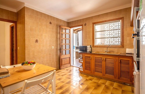 Cala Carbo Apartment | Spacious Apartment for 8 with Pool, Ocean View & A/C