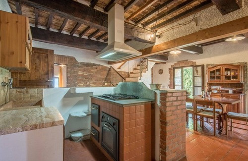 Radicondoli Apartment | Serene Manor Surrounded by Picturesque Hills and Amenities