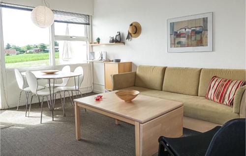 Sandkaas Apartment | Scenic Apartment in Allinge with Sea View and Pool Access