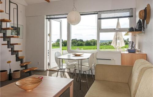 Sandkaas Apartment | Scenic Apartment in Allinge with Sea View and Pool Access