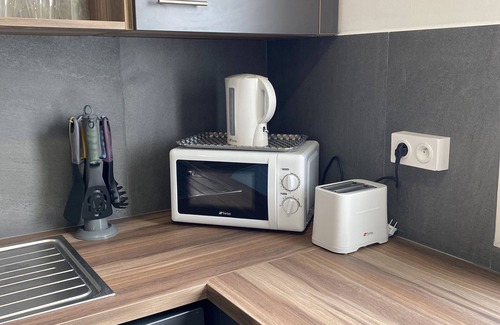 Sainte-Clotilde Centre Apartment | Top-Rated T3 Apartment with Family-Friendly Amenities