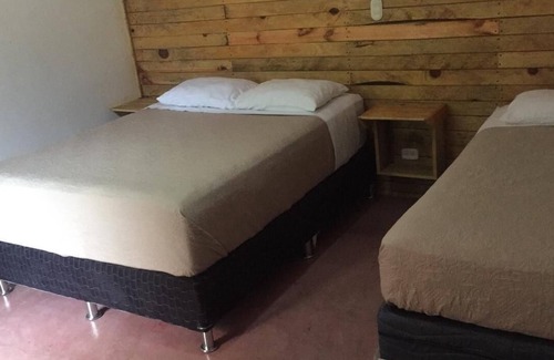 Santa Cruz La Laguna Hotel | Budget-Friendly Rooms with Family Amenities for a Cozy Stay