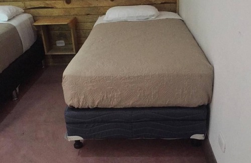 Santa Cruz La Laguna Hotel | Budget-Friendly Rooms with Family Amenities for a Cozy Stay