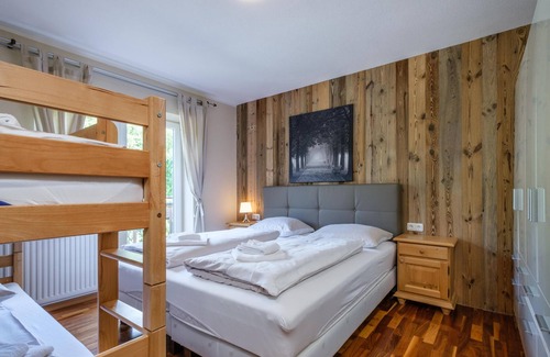 Ellmau Ski Chalet | Inviting Group Retreat with Sauna Near Ski Lifts & Bars