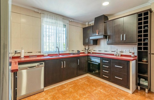 La Carlota House | Inviting Property with Cozy Units and Expansive Green Spaces