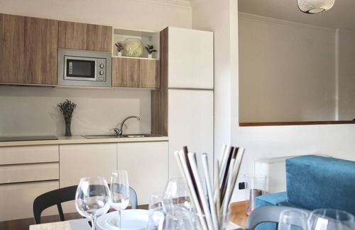 Torrino Apartment | Modern Retreat with Private Garage and Spa Amenities