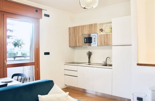 Torrino Apartment | Modern Retreat with Private Garage and Spa Amenities
