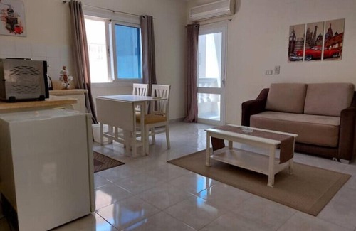 Village Road Apartment | Cozy Studio in Elegant Compound - Perfect for Families
