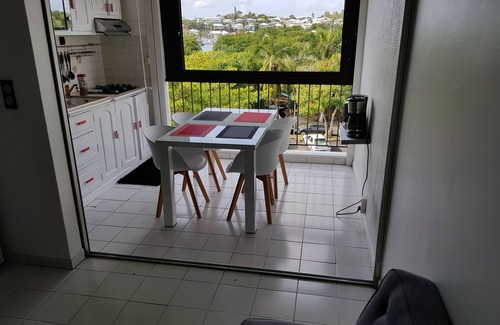 Bas du Fort Apartment | Stylish Duplex Steps from the Beach with Pool & Spa