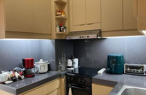 Cainta Condo | Stylish Lofted Retreat in Cainta-Pasig for Work & Relaxation