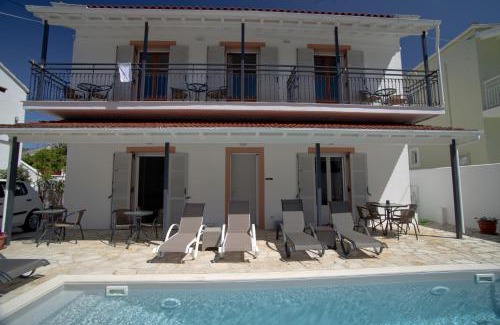 Kassiopi Apartment | Experience Nicola's Apartments: Oceanfront Bliss with Pool