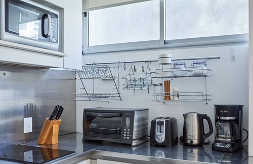 Palermo Condo | Perfect Retreat at Cabello Square with Pool & Spa Amenities