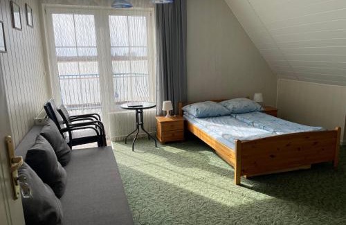 Trygort Bed & Breakfast | Relax at Niebieska Tawerna: Oceanfront Getaway Awaits