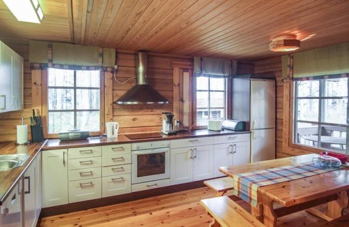 Kuortti House | Discover Niinimökki by Interhome: Lake View & Spa Retreat