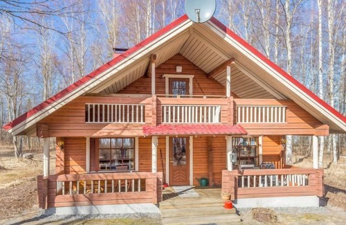 Kuortti House | Discover Niinimökki by Interhome: Lake View & Spa Retreat
