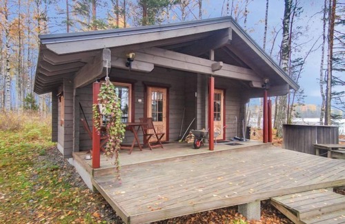 Kuortti House | Discover Niinimökki by Interhome: Lake View & Spa Retreat