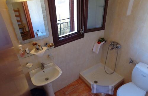Petra Apartment | Oceanfront Niki Studios with Pool and Hot Tub Amenities