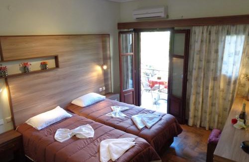 Petra Apartment | Oceanfront Niki Studios with Pool and Hot Tub Amenities