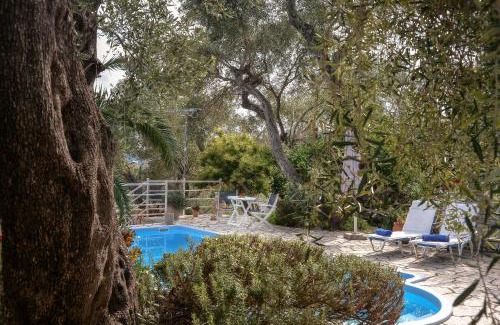 Koutsi House | Experience Nikolette: Oceanfront Getaway with Pool Access