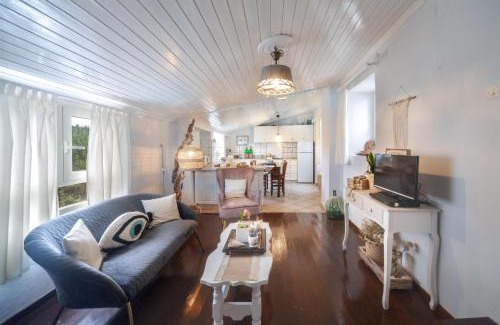 Koutsi House | Experience Nikolette: Oceanfront Getaway with Pool Access