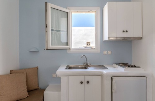 Kionia Apartment | Discover Ninemia Suites Tinos with Mountain View & Amenities