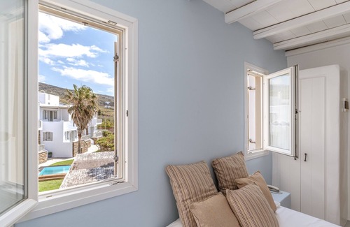 Kionia Apartment | Discover Ninemia Suites Tinos with Mountain View & Amenities