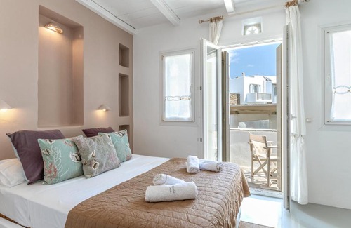 Kionia Apartment | Guest Rated Ninemia Suites Tinos with Pool & Family Comfort