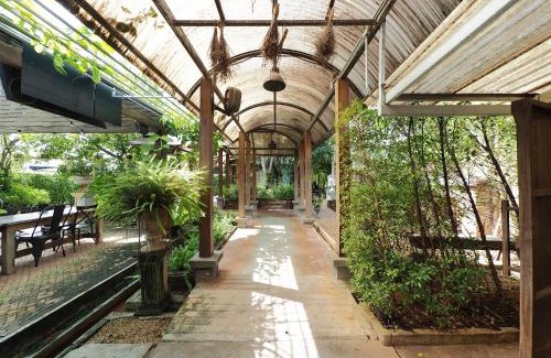 Makham Tia Hotel | Budget-Friendly Nipa Garden Hotel with Spa & Restaurant