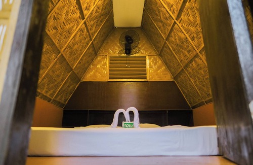 Loboc Hotel | Experience Nipa Hut Village: Relax by the Ocean and Pool