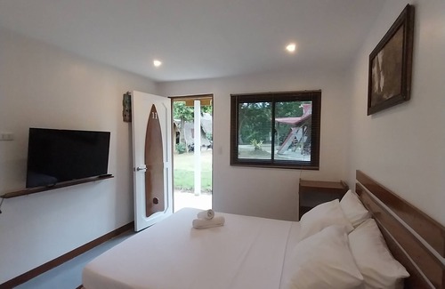Loboc Hotel | Experience Nipa Hut Village: Relax by the Ocean and Pool