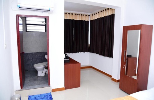 Anaikatti Hotel | Relax at Nirvana Holistic Living with Spa & Pool Access