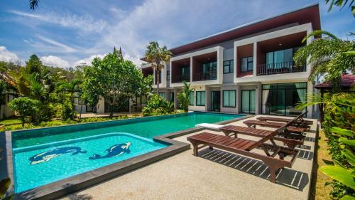 Wok Tum Resort | Discover Nitchanan Villa: Oceanfront Bliss with Pool