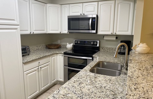 Titusville House | Pet-Friendly Townhouse with Ocean View on Space Coast