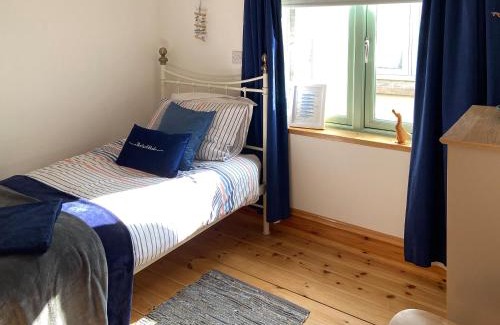 Belford House | Discover No2 The Neuk: Pet-Friendly Escape with 9/10 Ratings
