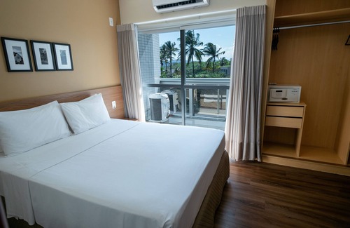 Jardim Camburi Hotel | Elegant Nobile Suites Diamond: Pool, Spa & Family-Friendly