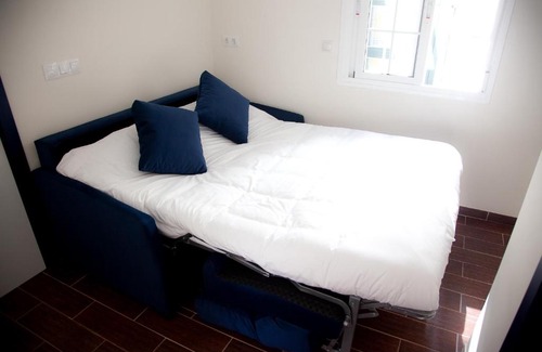 Triana Hotel | Welcoming Stay at Noches en Triana - Child-Friendly Haven