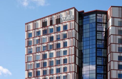 Tapiola Hotel | Experience Noli Otaniemi: Pet-Friendly Retreat with Pool