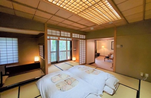 Jogakura Onsen Hotel | Inviting Japanese-Western Style Room in Aomori with Spa