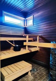 Rovaniemi Villa | Nordic Villa Retreat with Private Sledding Hill & High Ratings