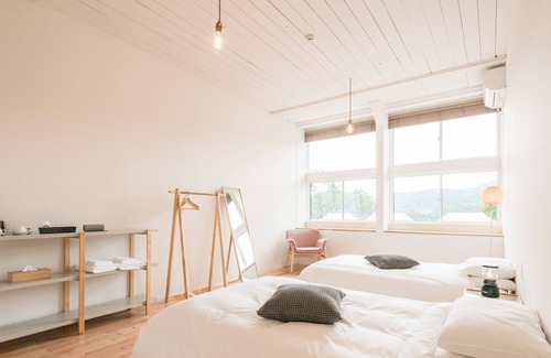 Goto Cottage | Nordisk Village Goto Islands Modern Room Renovated School Building