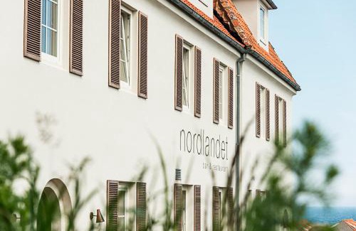 Sandvig Hotel | Nordlandet: Oceanfront Retreat with Private Beach & Great Reviews