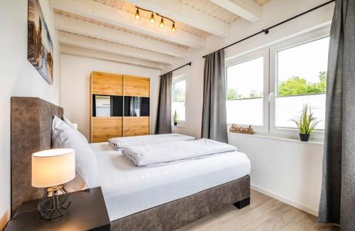 Busum House | Discover NordseeResort Büsum Ferienhaus 63 Küstenlodge