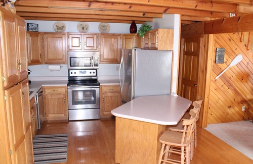 Big Creek Cabin | Discover Dawson Creek Lakefront Rentals with Dock & Pool