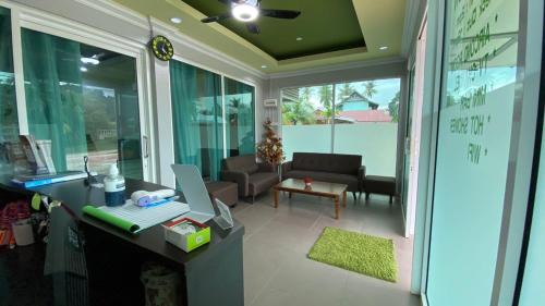 Temoyong Hotel | Relax at Norshah Village Resort with Pool & Family Amenities