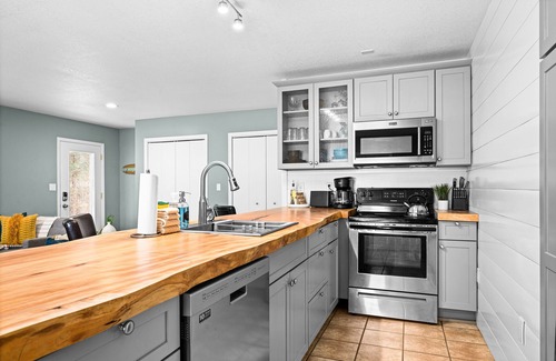 St. Louis County Apartment | North Coast Escape: Beach Access & Pet-Friendly Comfort