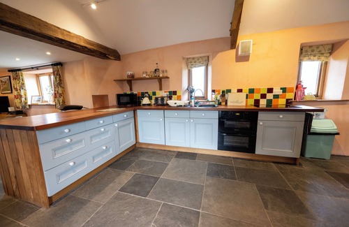 Ash Mill House | North Devon Countryside Escape. Dog friendly with views, large garden & paddock.