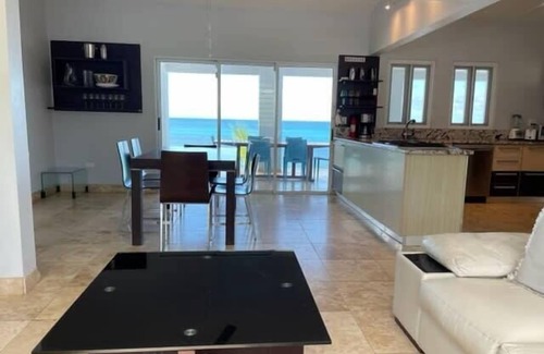 Bravos de Boston House | Elegant North Shore Pointe: Oceanfront Five Bedroom Retreat