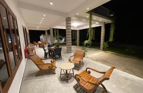 Pachchilaipalli House | Relax at North Joy Resort with Pool and Oceanfront Views